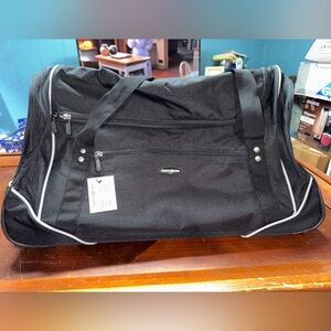 Samsonite Black Canvas Wheeled multi direction Rolling Travel Duffel Bag 28” New